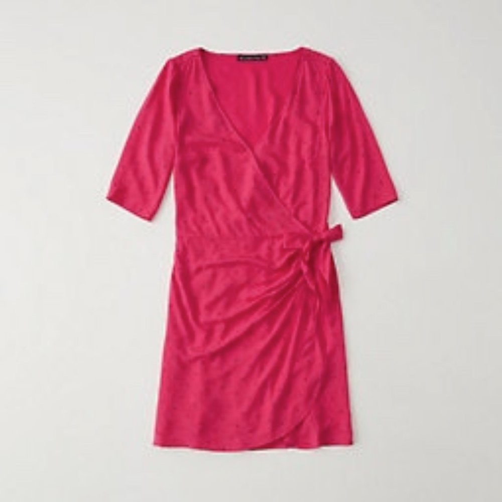 Bright pink dress with dots and faux wrap skirt